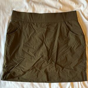 Columbia olive green mini skirt with spandex underneath